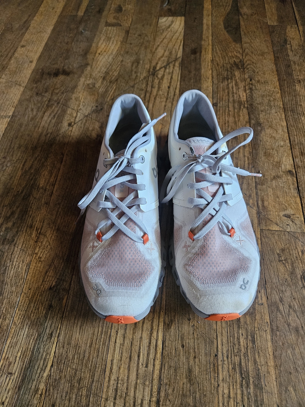 On Running Women's Light Gray Sneakers with Orange Accents